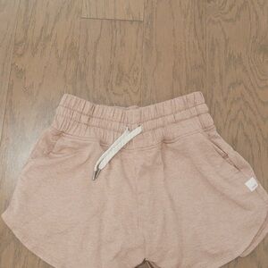 Vuori Women's Athletic Shorts in Tan